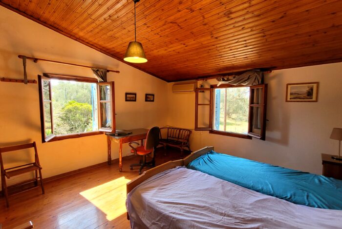 First floor bedroom with views to garden in maisonette South Corfu