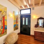 Wooden floors and stone details in renovated Paxos villa interior