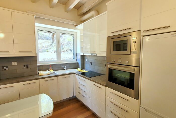Modern fitted kitchen in traditional Paxos property for sale