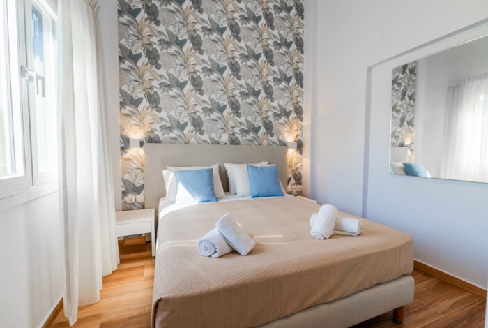 Bright bedroom with natural light in Gouvia Corfu apartment