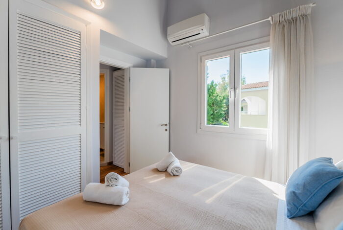 Comfortable bedroom with fitted wardrobe in Gouvia Corfu property