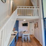 Stylish open plan living room and dining area in Corfu property