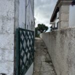 Entrance to the garden of the semi detached house in Arkadades