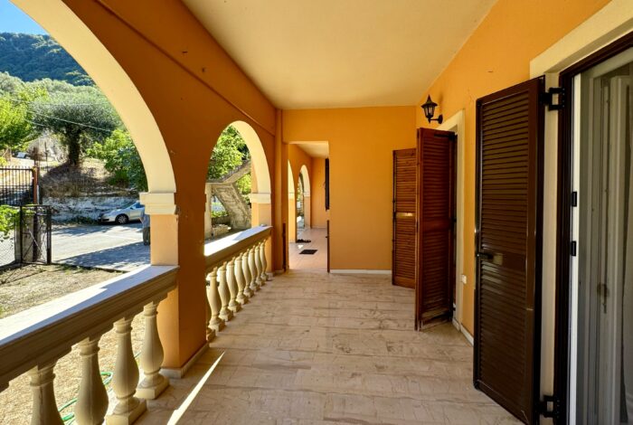 Ground floor covered balcony with access to the garden