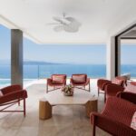 Outdoor lounge area with sea view seating