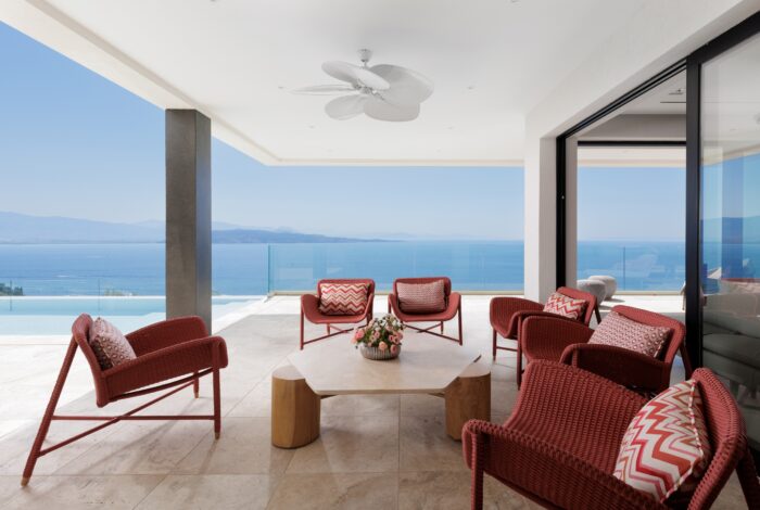 Outdoor lounge area with sea view seating