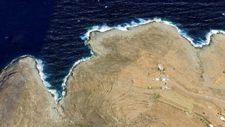Rocky beachfront in Serifos island with turquoise Aegean waters