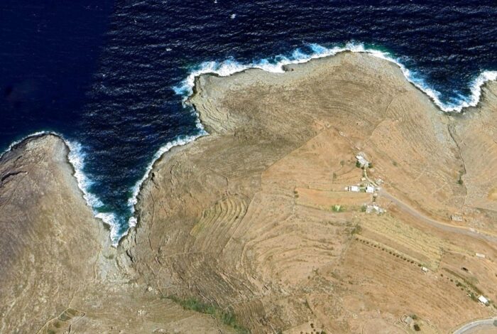 Rocky beachfront in Serifos island with turquoise Aegean waters
