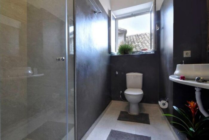 Bright bathroom with glass shower cabin, Corfu apartment near Liston Square