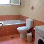Bright bathroom with neutral décor in Corfu real estate listing