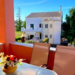 Spacious veranda perfect for outdoor dining or relaxation – Corfu real estate