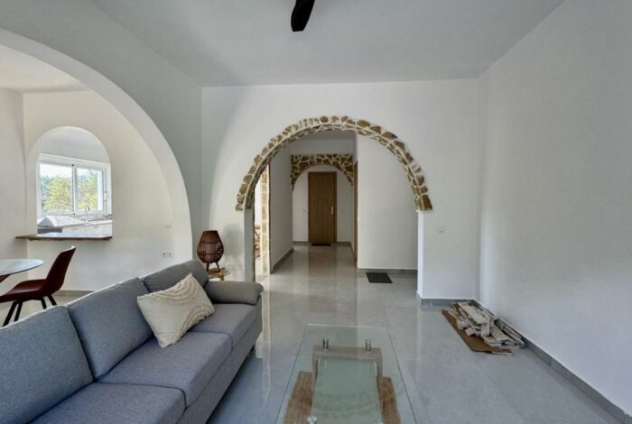 Bright living room interior with premium furniture and countryside view Corfu