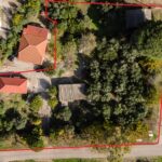 Drone view of Zacharo coastline showcasing 3,216sqm beachfront plot for sale