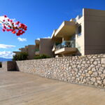 Alyki Boeotia apartment complex with sea views and stone architecture