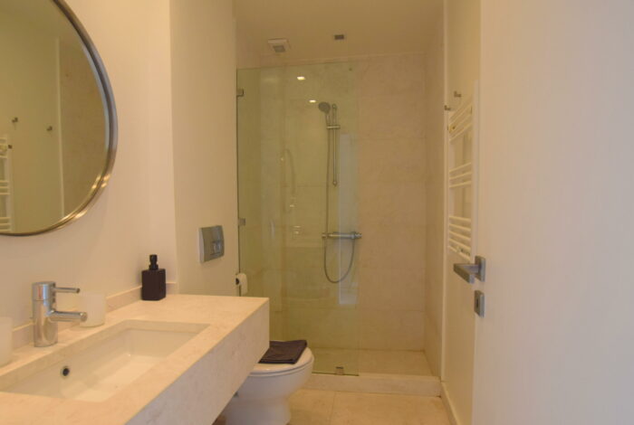 Modern bathroom inside studio apartment near Aliki beach