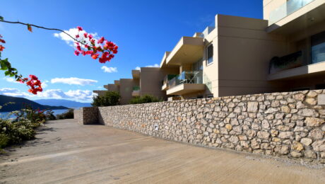 Alyki Boeotia apartment complex with sea views and stone architecture