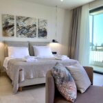 Ensuite bathroom with glass shower and minimalist design