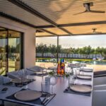 Outside dining area next to the swimming pool