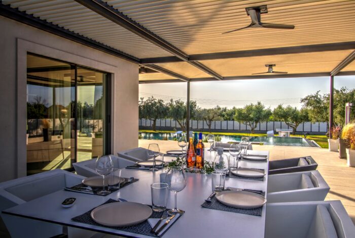 Outside dining area next to the swimming pool