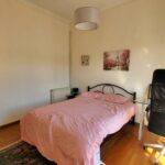 Well-lit bedroom ideal for permanent living or rental in Corfu apartment