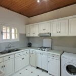 Kitchen area with wooden cupboards