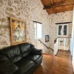 First floor sitting area with access to three bedrooms and bathroom