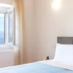 Bedroom with balcony access and sea view Corfu