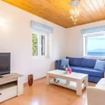 Open-plan living room in sea view villa Kassiopi