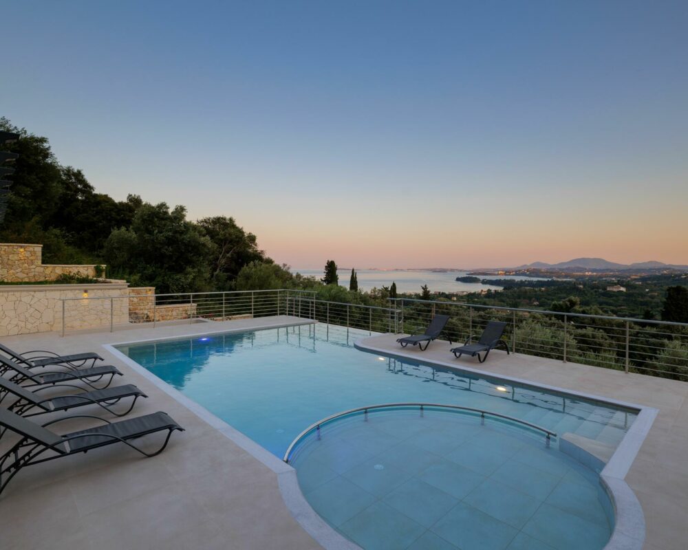 Swimming pool and terrace with sea views