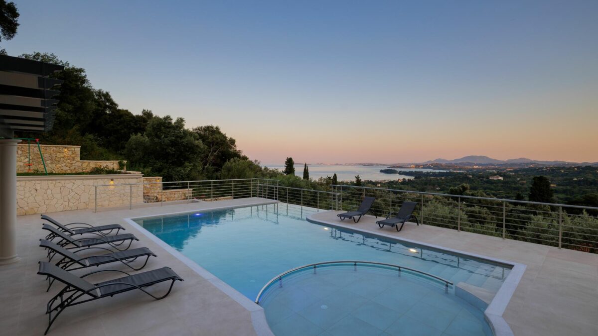 Swimming pool and terrace with sea views