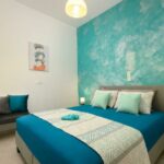 Elegant bedroom setup in high-rated Booking apartment with 9.9 guest score