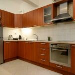 Fully equipped kitchen in successful Airbnb apartment for sale in Corfu Greece