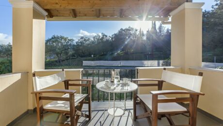 Balcony view overlooking green countryside