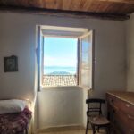 Bedroom interior in traditional detached house in Chlomos Corfu