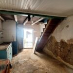 Traditional village house in Chlomos Corfu requiring full renovation with authentic stone surroundings