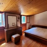 Bright master bedroom in Corfu Town neoclassical apartment with classic character