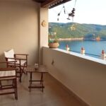 Balcony with open sea views in hillside property in Paleokastritsa