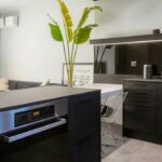 Modern kitchen and dining area in renovated Corfu home