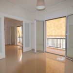 Renovated apartment living room in Tambouria Piraeus with bright natural light