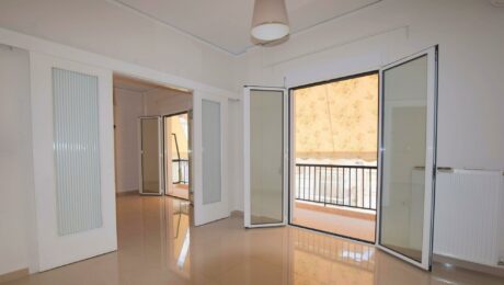 Renovated apartment living room in Tambouria Piraeus with bright natural light