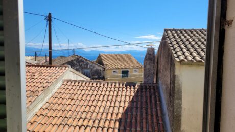 Balcony with sea views from bedroom in Chlomos South Corfu property