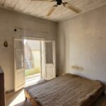 Bedroom on the first floor with access to the balcony