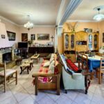 Open-plan living area in Agros villa featuring natural light and traditional design