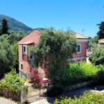 Traditional two-storey house for sale in Gastouri Corfu with spacious garden and courtyard