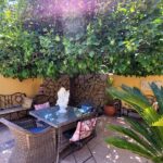 Outdoor dining area in renovated Corfu house