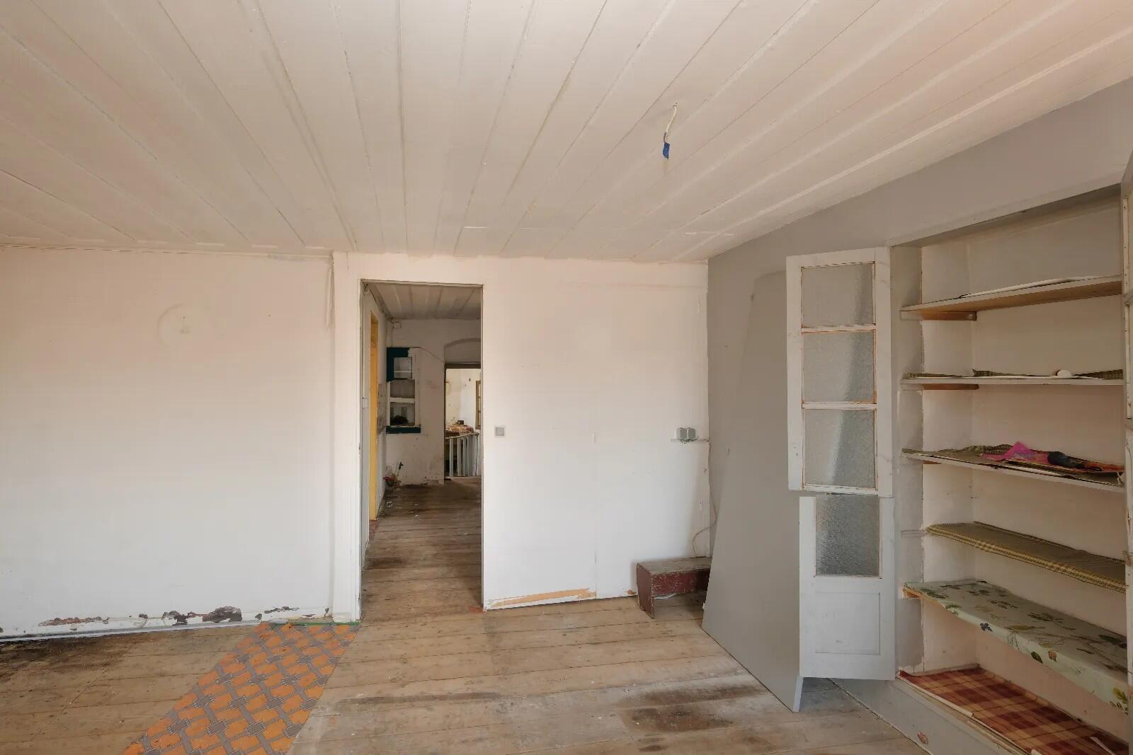Partially renovated first floor of the historic property in Nymfes