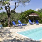 Swimming pool area in the Gastouri property