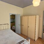 Bedroom with access to the kitchen and the living room