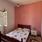 Bedroom in traditional house in Chlomos