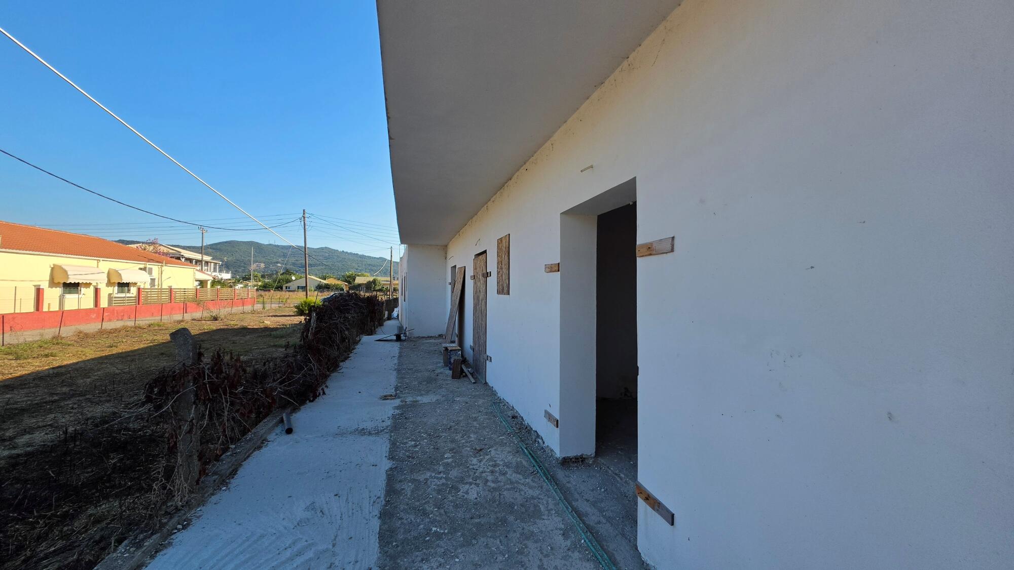 Apartment complex with four one-bedroom and two two-bedroom apartments in Corfu